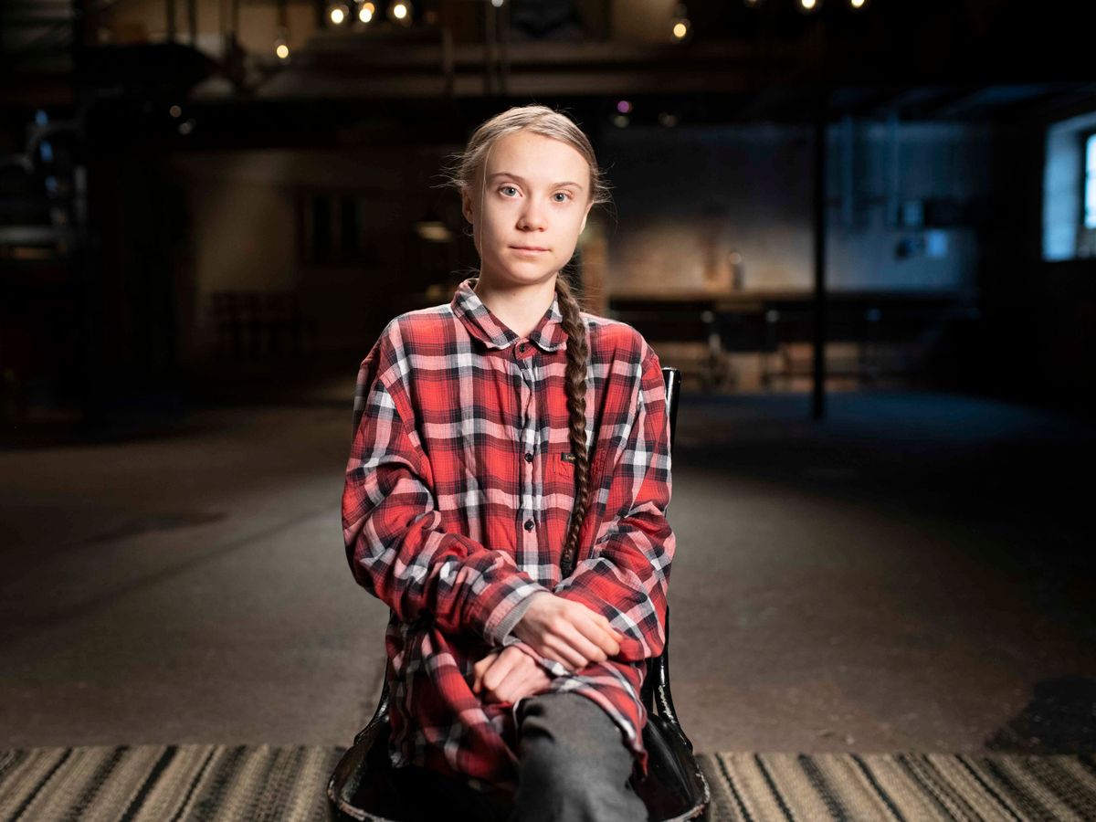 Greta Thunberg seated during an interview